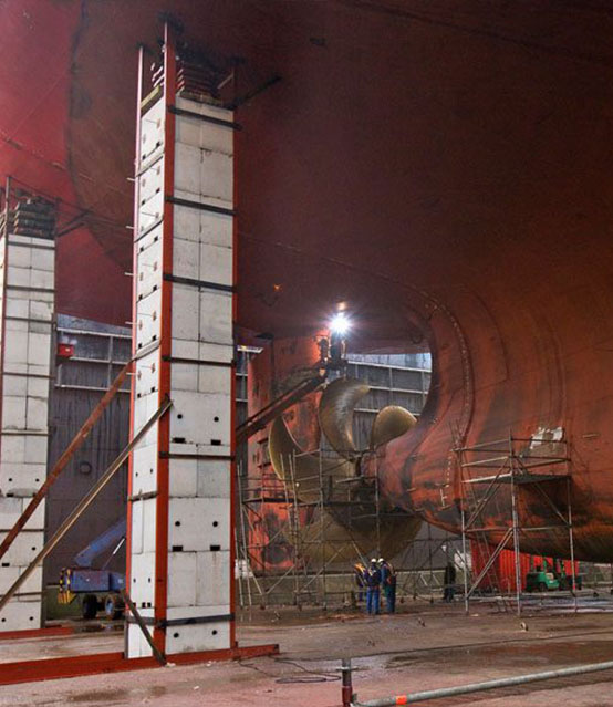 Container vessel docked being repaired