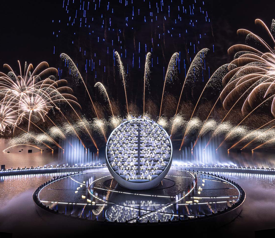 Rotating disc shaped stage in Hatta Dam with fireworks